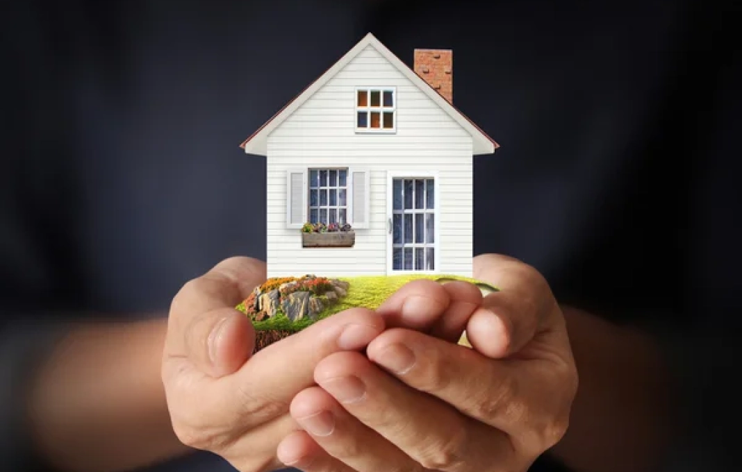 depositphotos_88988916-stock-photo-holding-house-representing-home-ownership