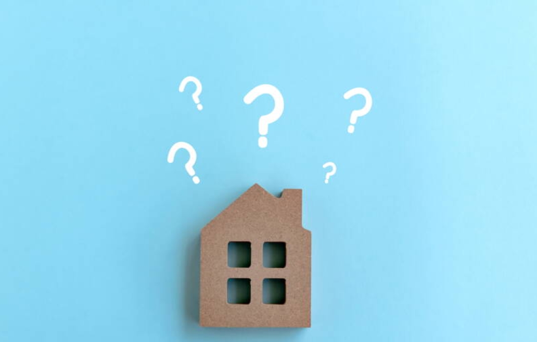 Wood House Model with question marks